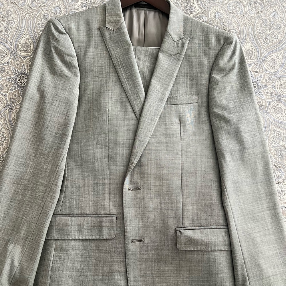 This is a CK 100% Wool Slim Fit Suit